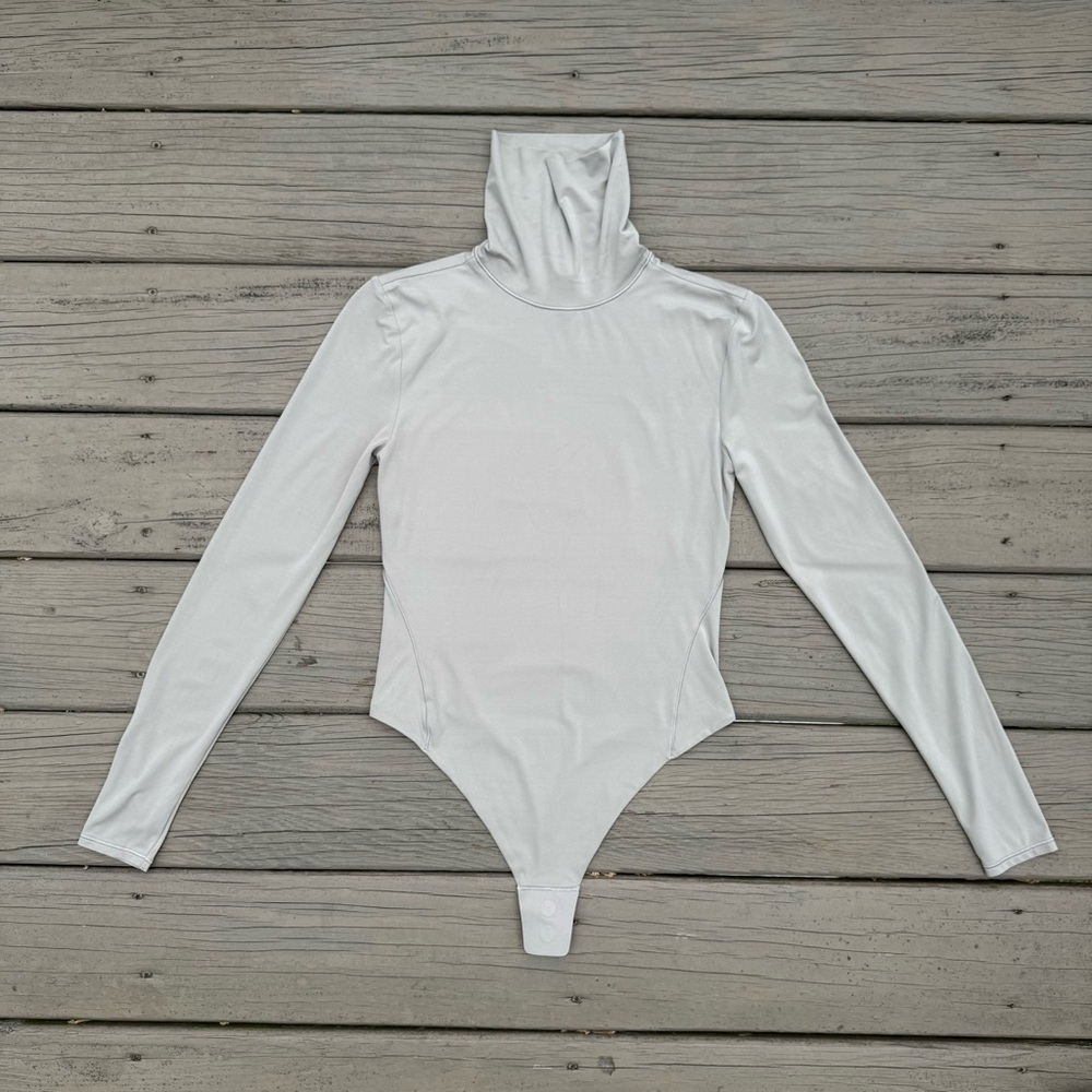 Lululemon Wundermost Ultra-Soft Nulu Turtleneck Bodysuit in Riverstone size S